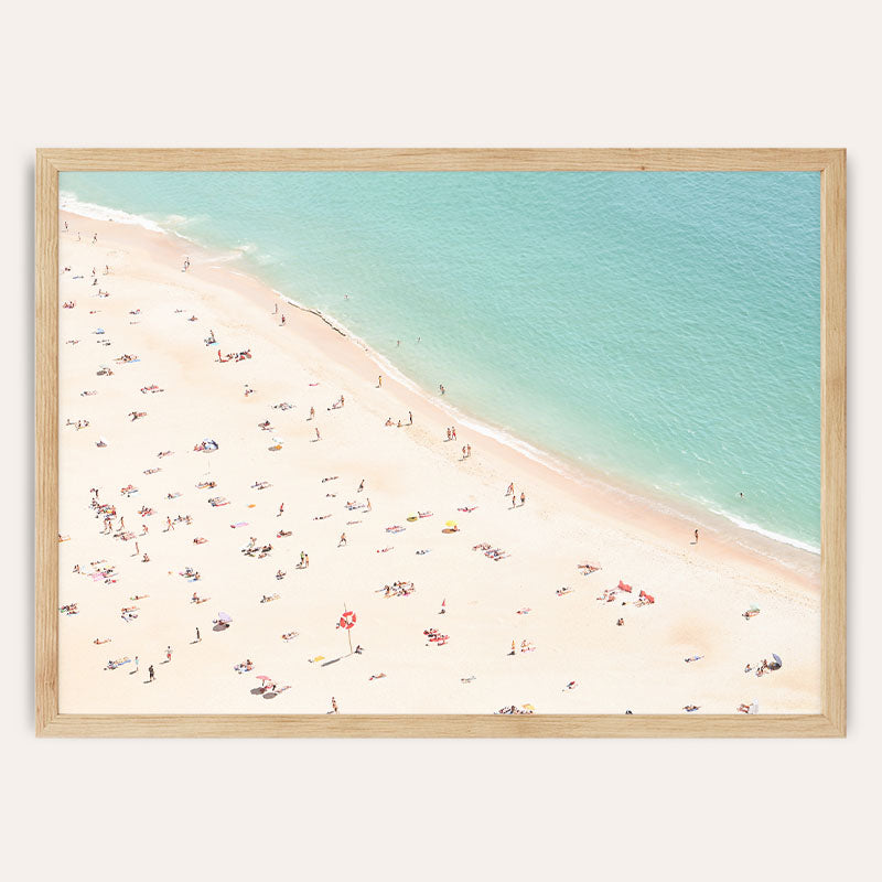 an aerial view of a beach with people on it