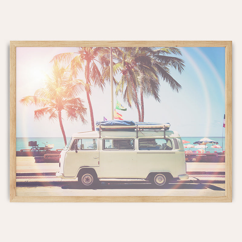 a white van with a surfboard on top of it