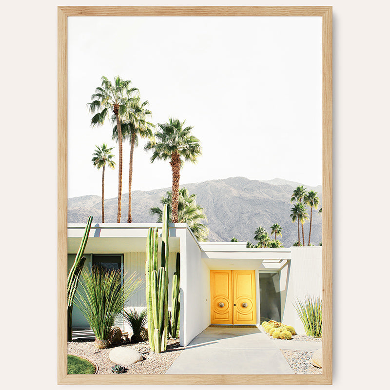 a picture of a house with a yellow door