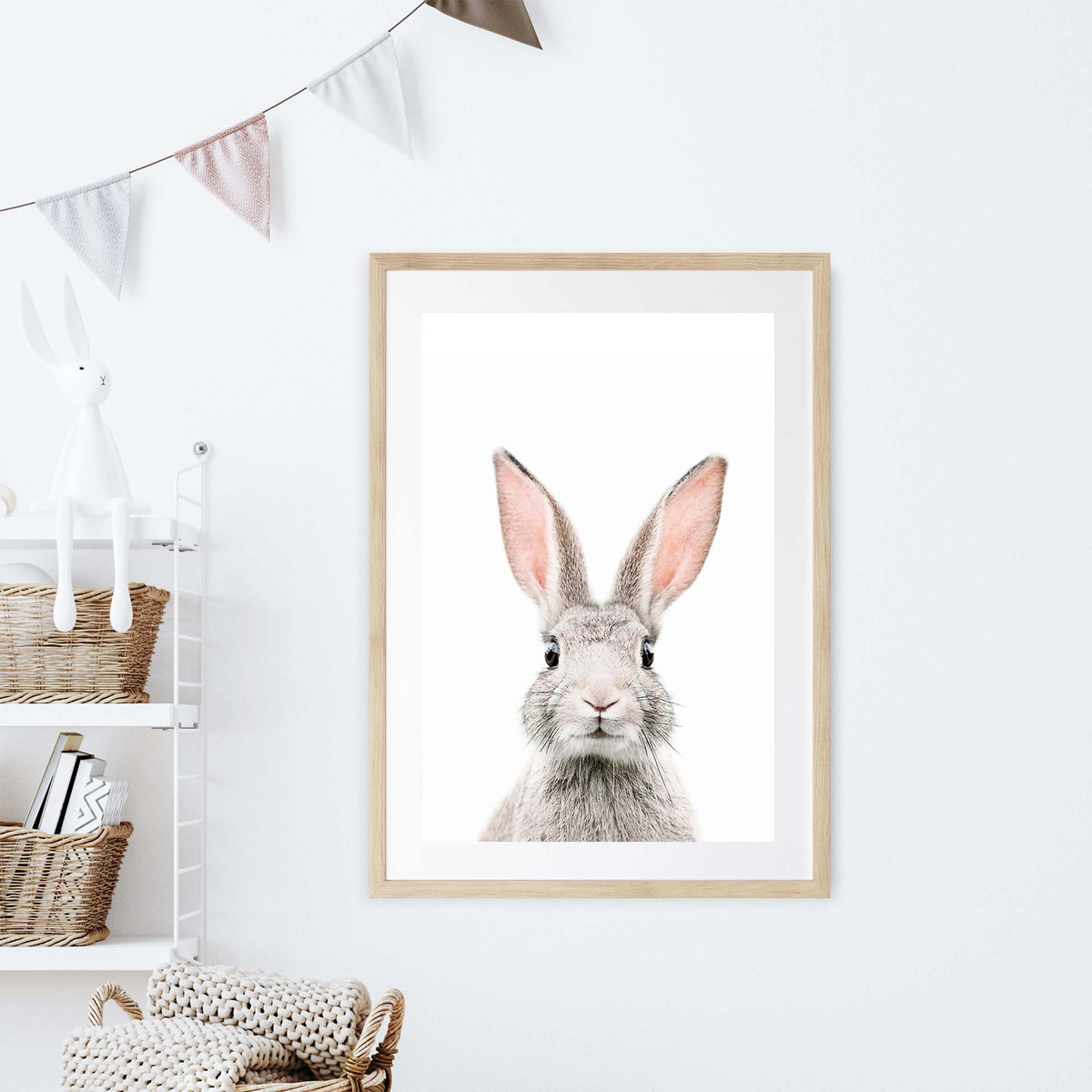 a framed picture of a bunny rabbit