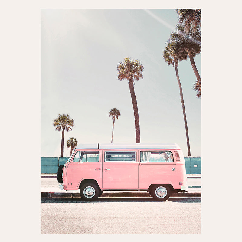 a pink van parked on the side of the road