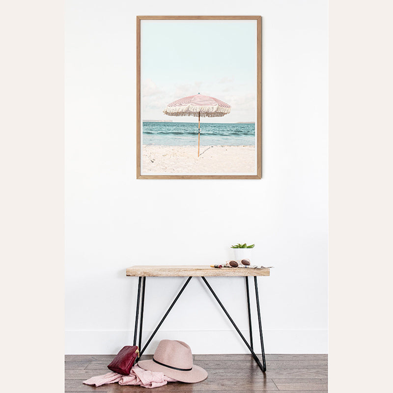 a picture of a beach with an umbrella